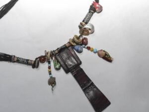 Talisman Touareg, Tribal Leather Pouch Necklace with Mixed Glass Beads and Charms
